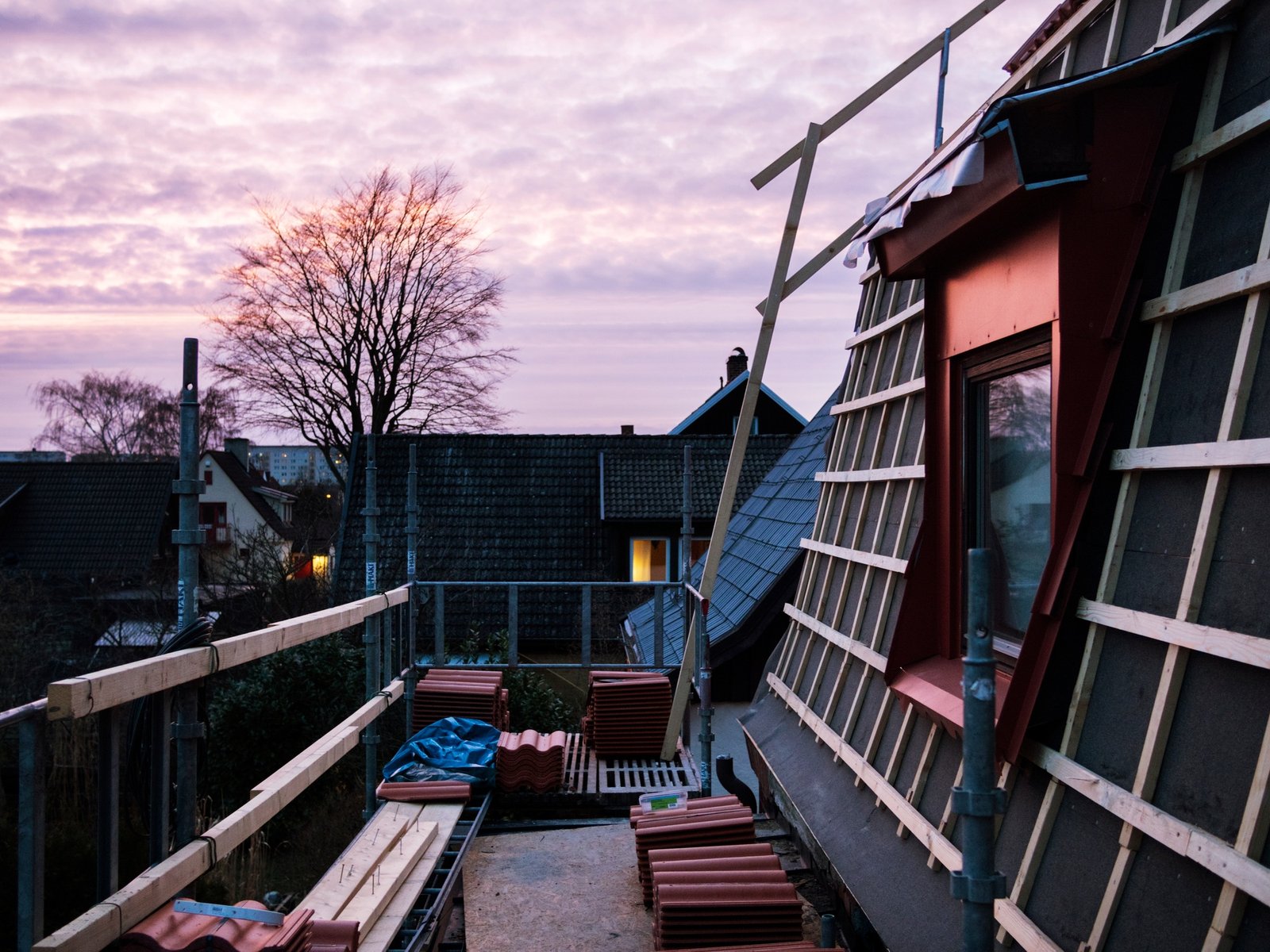 Stack of roof tiles at construction site